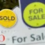 Sold and for sale signs