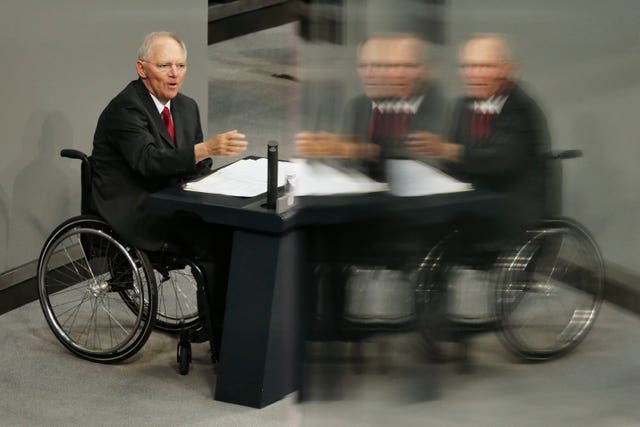 1595ffc5295c46bcad171a972822603d German finance minister Wolfgang Schaeuble delivers his speech during the first day of the debate about the German budget for 2014 at the parliament Bundestag in Berlin