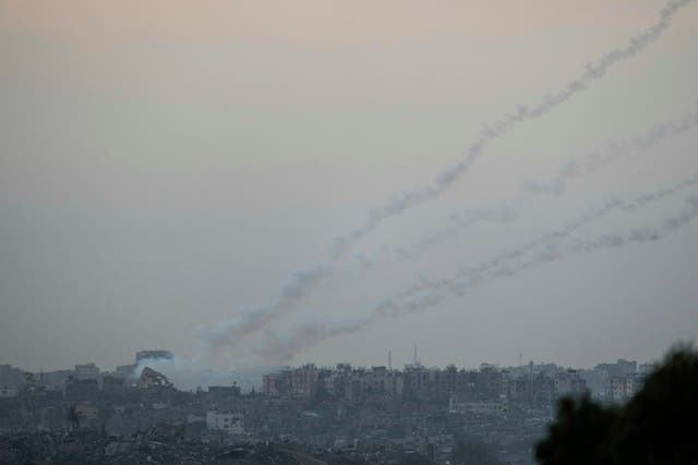Trails of rockets fired towards Israel from the Gaza Strip, as seen from southern Israel