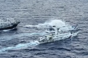 Chinese coast guard ships blast Philippine vessels with water cannon