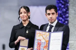 Twins accept Nobel Peace Prize on behalf of mother jailed in Iran