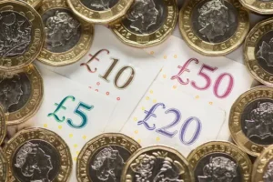 Pay growth eases back sharply as vacancies drop in record run of falls – ONS
