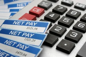Pay growth slows as jobs market clouds gather