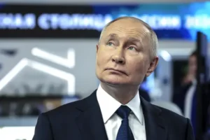 Russia’s ruling party backs Putin’s re-election bid