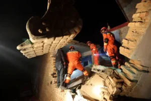 At least 118 killed by devastating China earthquake as rescuers battle sub-zero temperatures
