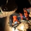 Rescue workers search a collapsed house in a village in Gansu, China