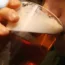 Man drinking pint