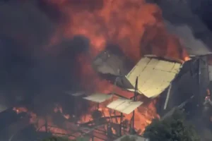 Two injured and homes destroyed as Australian wildfire burns out of control