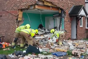 Car smashes into Essex house ‘at 80mph’ on Christmas Day, as man arrested