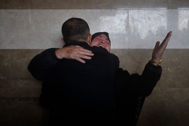 66195c19311743bb94ba602251ff1573 A Palestinian woman cries for her relatives who were killed in the Israeli bombardment of the Gaza Strip, at Nasser hospital in Khan Younis