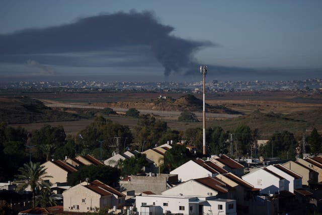 7c23f4307ab641ff9df7d89541ce5bd2 Smoke rises following an Israeli bombardment in the Gaza Strip, as seen from southern Israel, on Friday