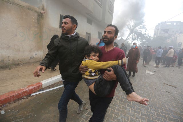 7dd897b2e1844af1bca5315c94358e36 Palestinians evacuate survivors of an Israeli strike in Rafah, Gaza Strip
