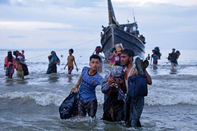f72c41890e5c4754a9f24b52261e36f8 Rohingya fleeing