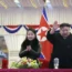 Kim Jong Un with his daughter at a new year celebration