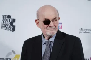 Trial of man accused of Salman Rushdie attack may be delayed by author’s memoir