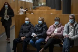 Spain makes masks mandatory in hospitals after spike in Covid and flu cases
