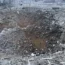 A crater next to a private building destroyed after a Russian missile attack in Novomoskovsk, near Kryvyi Rih, Ukraine, on Monday