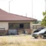 A hearse and van sit outside the Return to Nature Funeral Home in October