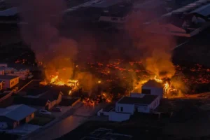 Iceland volcano eruption spills lava into town and engulfs houses in fiery inferno