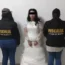 A Mexican bride spent her wedding day in handcuffs last month after she and her soon-to-be husband were charged with a massive extortion scheme involving drug cartels