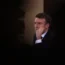 French President Emmanuel Macron listens to a question during his first prime-time news conference