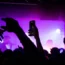 A crowd at a small music venue