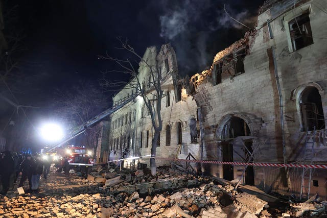ae1f0a5d217243e6b7f446e0a3d1e8c1 An apartment building damaged in a Russian rocket attack is seen in Kharkiv, Ukraine, in the early hours of Wednesday