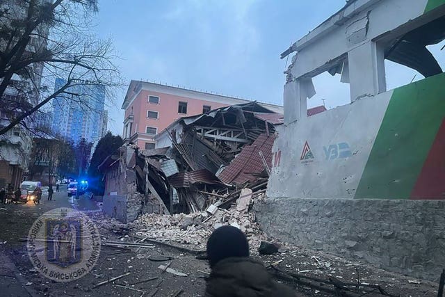 d67e8d89ab2f46cba15775a3934b899c A destroyed apartment building in Kyiv