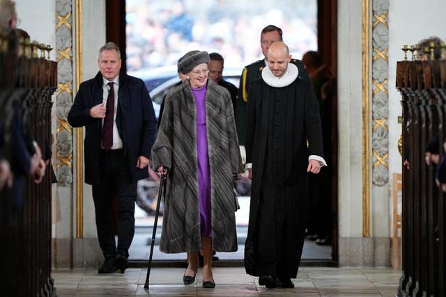 Denmark’s Queen Margrethe, centre left, arrives for a service on the occasion of the change of throne in Denmark, at Aarhus Cathedral, in Aarhus, Denmark