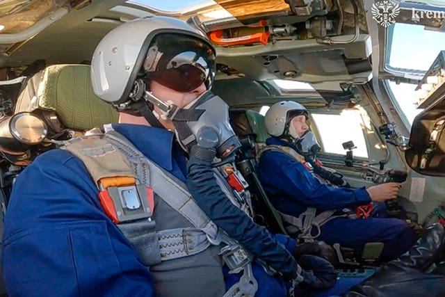 2c7ece677d7f436a8c9680c5b8e46f68 Vladimir Putin in the co-pilot’s seat of the plane