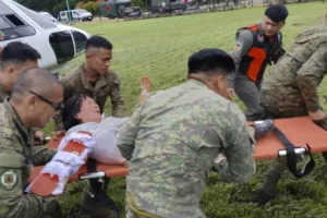 Six dead and dozens missing as landslide hits village in Philippines