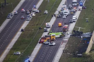 Probe after two die as private jet crashes onto major road in Florida