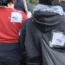 The women displayed images of paragliders at a pro-Palestine march in central London a week after Hamas launched its attack on Israel