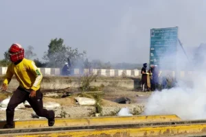Indian farmers clash with police for second day amid protests