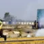Tear gas is fired at a protester