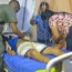 A miner gets medical attention at at tent set up next to the mine
