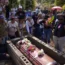 People mourn the death of miner Santiago Mora