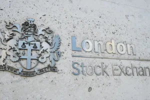 FTSE 100 makes afternoon gains as international peers break records