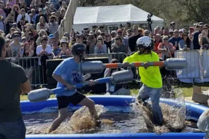 Tank-topped teams compete in spoof sporting event in Florida