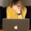 A woman with a laptop
