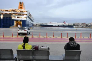 Strikes halt trains and ferries in Greece one year after rail disaster