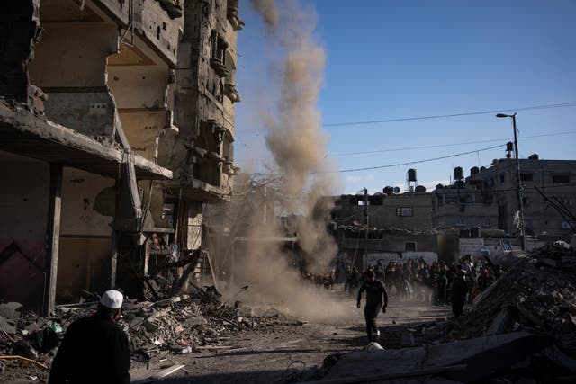 7bf5a3c2b4cc433583810ccdb4078a0d Palestinians look at air strike damage in Rafah