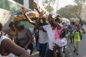 Gunfire paralyses Haiti’s capital as gang leader threatens police chief