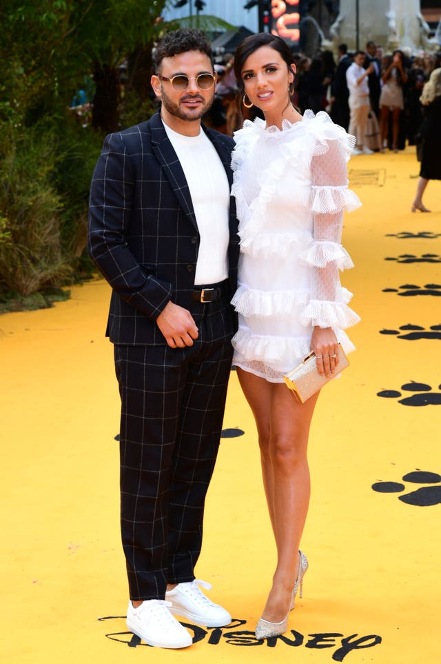 2-44108629 Ryan Thomas and Lucy Mecklenburgh on the red carpet for Disney’s The Lion King European Premiere in London