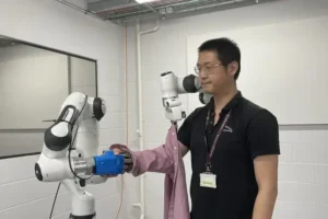 Two arms are better than one for robot dressers, says researcher