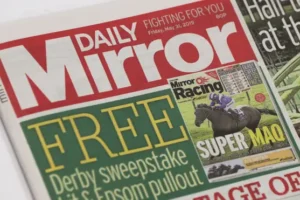 Mirror owner Reach expects £20m dip in phone-hacking costs after High Court case