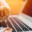 Bitcoin with laptop computer