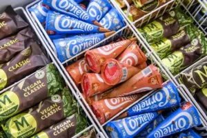 Unilever helps lift FTSE 100 into the green ahead of new UK inflation data