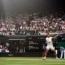 Carlos Alcaraz in action against Novak Djokovic in the men's singles final in last year's Wimbledon Championships