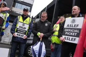 Train drivers mount picket lines outside railway stations as strikes continue